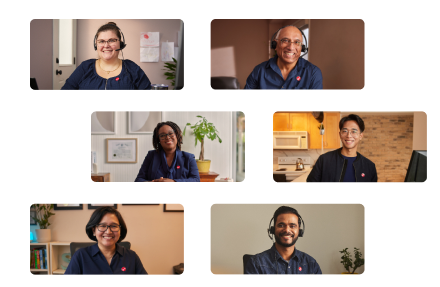 A group of people in office with their smiles on their faces.