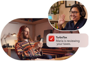 TurboTax expert Maria smiles and waves at a young man who is looking at his phone. He sees a message from TurboTax. The message says: Maria is reviewing your taxes.