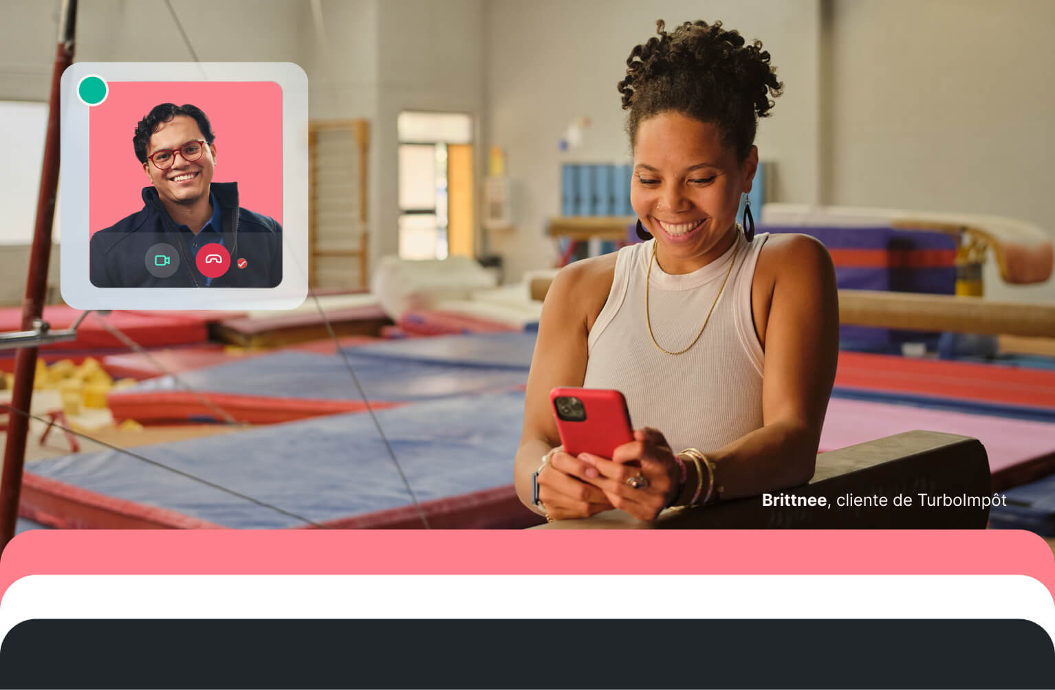 A smiling small business owner in a gymnastics studio uses her smartphone to consult with a TurboTax expert via a live video call overlay.