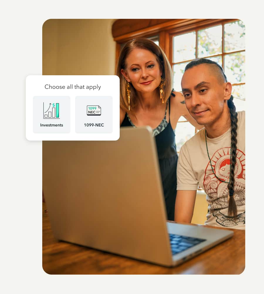 A customer smiling and excited while looking at his federal refund he's getting with TurboTax's help.