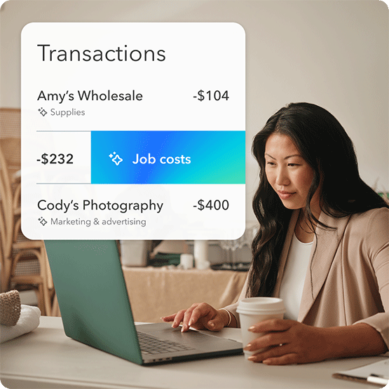 Woman using a laptop in a home office to check on her business profitability. We see a chart depicting a job cost analysis, and profitability. There is implied use of AI smart categorization, and ease-of-use of the QuickBooks accounting software.
