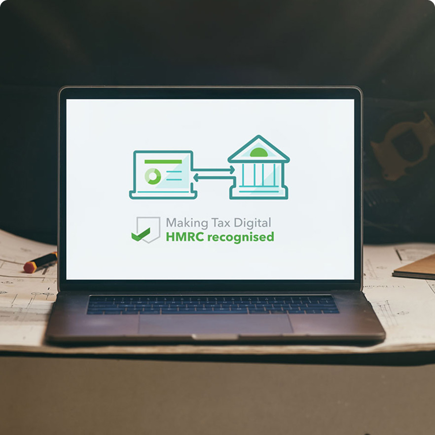 A laptop computer sitting on top of a desk.